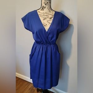 Dress with pockets and open back